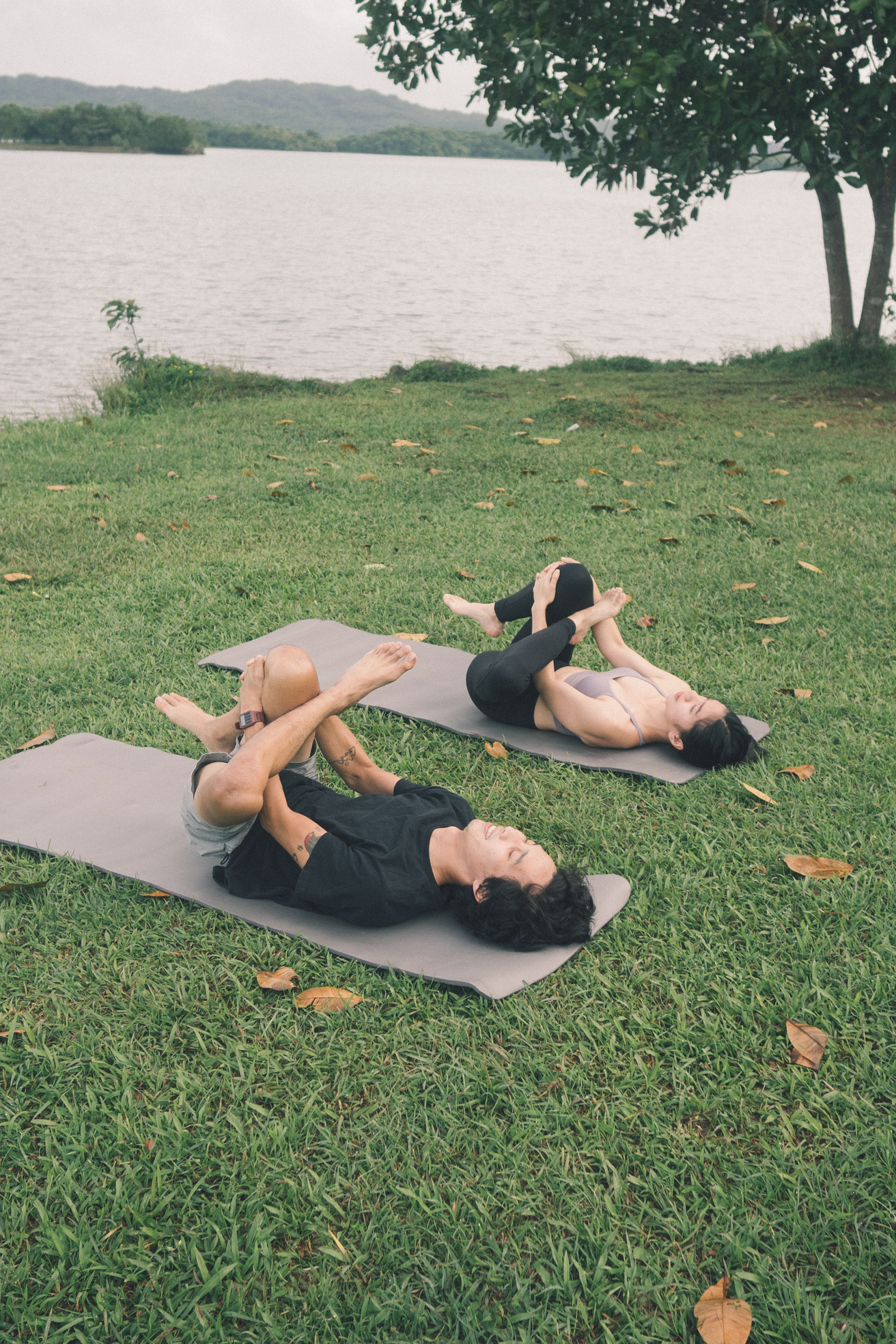 Couple Doing Yoga Outdoors